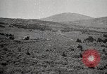 Image of Holt tractor pulling trucks through wet sand Nevada United States USA, 1919, second 45 stock footage video 65675025558