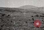 Image of Holt tractor pulling trucks through wet sand Nevada United States USA, 1919, second 52 stock footage video 65675025558