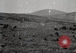 Image of Holt tractor pulling trucks through wet sand Nevada United States USA, 1919, second 56 stock footage video 65675025558