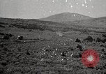 Image of Holt tractor pulling trucks through wet sand Nevada United States USA, 1919, second 57 stock footage video 65675025558
