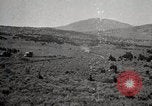 Image of Holt tractor pulling trucks through wet sand Nevada United States USA, 1919, second 58 stock footage video 65675025558