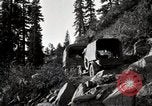 Image of U.S. Army motor transport convoy crossing mountains California United States USA, 1919, second 4 stock footage video 65675025559