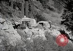 Image of U.S. Army motor transport convoy crossing mountains California United States USA, 1919, second 26 stock footage video 65675025559