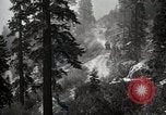 Image of U.S. Army motor transport convoy in picturesque mountains California United States USA, 1919, second 39 stock footage video 65675025560