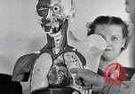Image of flight nurses learning about breathing devices Montgomery Alabama USA, 1951, second 48 stock footage video 65675025615
