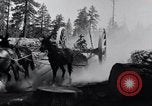 Image of large wheeled rig hauling cut logs United States USA, 1920, second 10 stock footage video 65675025658