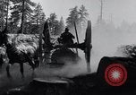 Image of large wheeled rig hauling cut logs United States USA, 1920, second 11 stock footage video 65675025658