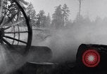 Image of large wheeled rig hauling cut logs United States USA, 1920, second 14 stock footage video 65675025658