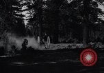 Image of large wheeled rig hauling cut logs United States USA, 1920, second 17 stock footage video 65675025658