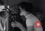 Image of Professor checks a machine Oxford Ohio USA, 1935, second 7 stock footage video 65675025715