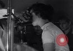 Image of Professor checks a machine Oxford Ohio USA, 1935, second 8 stock footage video 65675025715