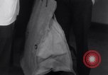 Image of Professor checks a machine Oxford Ohio USA, 1935, second 14 stock footage video 65675025715
