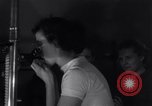 Image of Professor checks a machine Oxford Ohio USA, 1935, second 18 stock footage video 65675025715