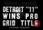 Image of Football game between Lions and Giants in mid 1930s Detroit Michigan USA, 1935, second 1 stock footage video 65675025719