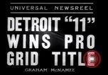 Image of Football game between Lions and Giants in mid 1930s Detroit Michigan USA, 1935, second 3 stock footage video 65675025719