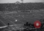 Image of Football game between Lions and Giants in mid 1930s Detroit Michigan USA, 1935, second 20 stock footage video 65675025719