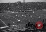 Image of Football game between Lions and Giants in mid 1930s Detroit Michigan USA, 1935, second 21 stock footage video 65675025719