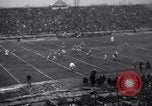 Image of Football game between Lions and Giants in mid 1930s Detroit Michigan USA, 1935, second 22 stock footage video 65675025719