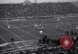 Image of Football game between Lions and Giants in mid 1930s Detroit Michigan USA, 1935, second 23 stock footage video 65675025719