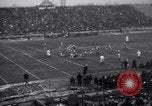 Image of Football game between Lions and Giants in mid 1930s Detroit Michigan USA, 1935, second 25 stock footage video 65675025719