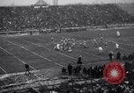 Image of Football game between Lions and Giants in mid 1930s Detroit Michigan USA, 1935, second 26 stock footage video 65675025719