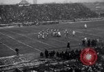 Image of Football game between Lions and Giants in mid 1930s Detroit Michigan USA, 1935, second 29 stock footage video 65675025719