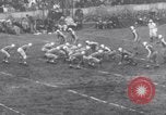 Image of Football game between Lions and Giants in mid 1930s Detroit Michigan USA, 1935, second 34 stock footage video 65675025719