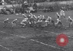 Image of Football game between Lions and Giants in mid 1930s Detroit Michigan USA, 1935, second 37 stock footage video 65675025719