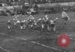 Image of Football game between Lions and Giants in mid 1930s Detroit Michigan USA, 1935, second 38 stock footage video 65675025719