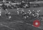 Image of Football game between Lions and Giants in mid 1930s Detroit Michigan USA, 1935, second 39 stock footage video 65675025719