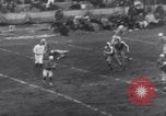 Image of Football game between Lions and Giants in mid 1930s Detroit Michigan USA, 1935, second 40 stock footage video 65675025719