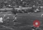 Image of Football game between Lions and Giants in mid 1930s Detroit Michigan USA, 1935, second 42 stock footage video 65675025719