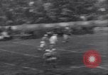 Image of Football game between Lions and Giants in mid 1930s Detroit Michigan USA, 1935, second 43 stock footage video 65675025719