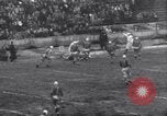 Image of Football game between Lions and Giants in mid 1930s Detroit Michigan USA, 1935, second 49 stock footage video 65675025719