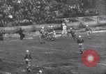 Image of Football game between Lions and Giants in mid 1930s Detroit Michigan USA, 1935, second 50 stock footage video 65675025719