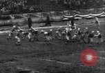 Image of Football game between Lions and Giants in mid 1930s Detroit Michigan USA, 1935, second 55 stock footage video 65675025719