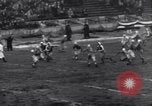 Image of Football game between Lions and Giants in mid 1930s Detroit Michigan USA, 1935, second 56 stock footage video 65675025719