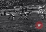 Image of Football game between Lions and Giants in mid 1930s Detroit Michigan USA, 1935, second 57 stock footage video 65675025719