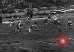 Image of Football game between Lions and Giants in mid 1930s Detroit Michigan USA, 1935, second 58 stock footage video 65675025719