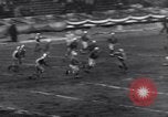 Image of Football game between Lions and Giants in mid 1930s Detroit Michigan USA, 1935, second 59 stock footage video 65675025719