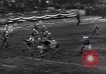 Image of Football game between Lions and Giants in mid 1930s Detroit Michigan USA, 1935, second 60 stock footage video 65675025719