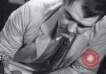 Standbild Tätowierung der Sozialversicherungsnummer Chicago Illinois USA, 1937, aus Sekunde 47 historischem Filmmaterial Videoclip 65675025727