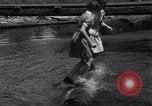 Standbild log rolling Longview Washington USA, 1937, aus Sekunde 14 historischem Filmmaterial Videoclip 65675025736