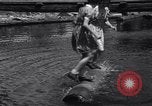 Standbild log rolling Longview Washington USA, 1937, aus Sekunde 16 historischem Filmmaterial Videoclip 65675025736