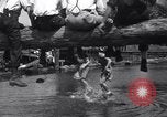 Standbild log rolling Longview Washington USA, 1937, aus Sekunde 28 historischem Filmmaterial Videoclip 65675025736