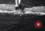 Standbild log rolling Longview Washington USA, 1937, aus Sekunde 39 historischem Filmmaterial Videoclip 65675025736