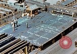 Image of Assembly of bottom shells for Liberty ship during World War 2 California United States USA, 1942, second 30 stock footage video 65675025792