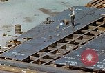 Image of Assembly of bottom shells for Liberty ship during World War 2 California United States USA, 1942, second 42 stock footage video 65675025792