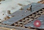 Image of Assembly of bottom shells for Liberty ship during World War 2 California United States USA, 1942, second 49 stock footage video 65675025792