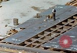 Image of Assembly of bottom shells for Liberty ship during World War 2 California United States USA, 1942, second 50 stock footage video 65675025792